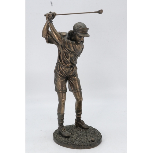 80 - A bronze effect resin statue of a golfer, measures approx. 34.5cm high