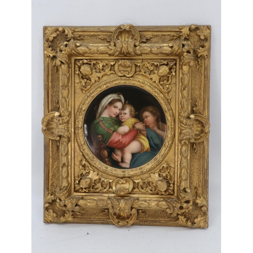 90 - A framed Berlin porcelain plaque after Raphael, frame measures approx. 12