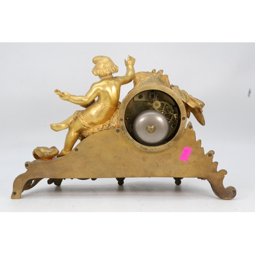 95 - Gilt spelter cased clock, with two keys and pendulum