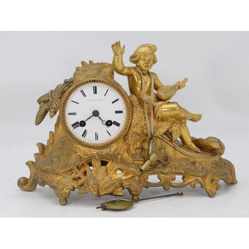 95 - Gilt spelter cased clock, with two keys and pendulum