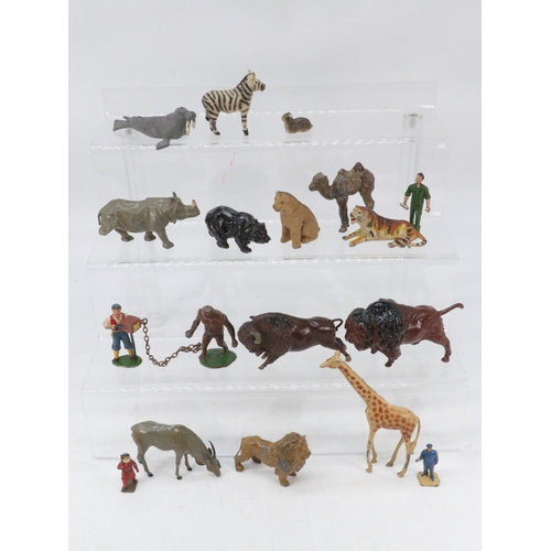 98 - Quantity of Britains and others hollow cast zoo animals together with Farm animals etc