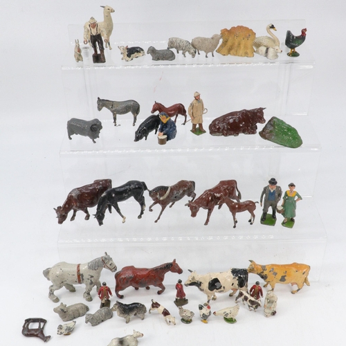 98 - Quantity of Britains and others hollow cast zoo animals together with Farm animals etc