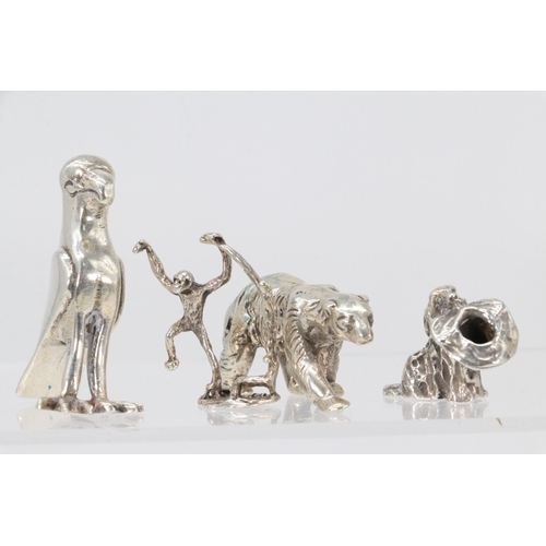 28A - Egyptian silver miniature animals to include a monkey, polar bear and dog and a bird