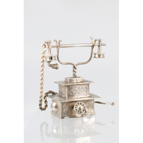 7 - An Egyptian silver vintage style miniature telephone, approx. 8cm tall, approx. 75g