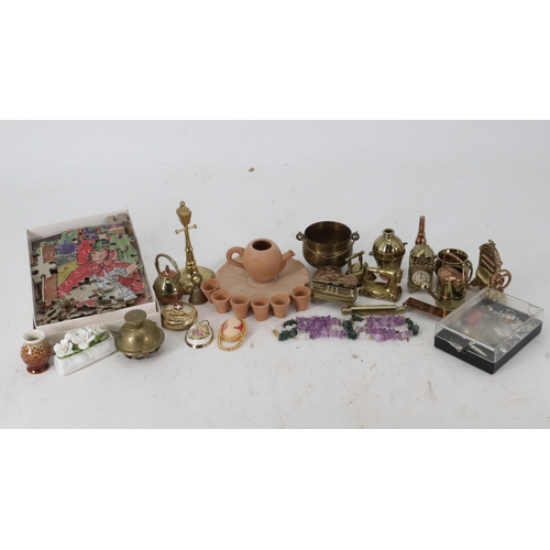 15 - An assortment of miniatures to include dolls house items, small brass ornaments, a puzzle and an ame... 