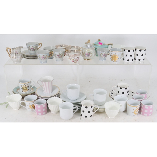 45 - An assortment of coffee cans, cups, saucers etc..