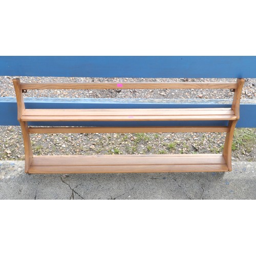 64 - Ercol wall plate rack. Approx. 97cm wide.