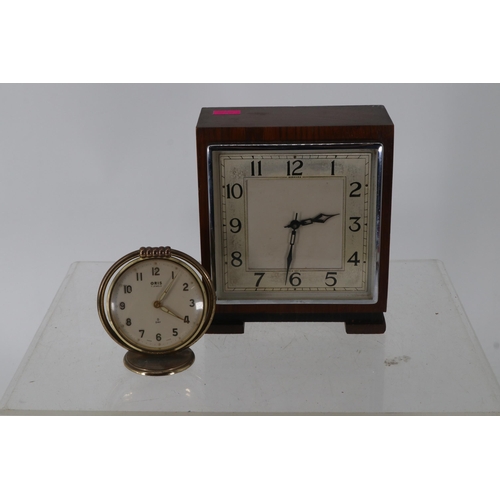 66 - Garrard art deco style wind up mantle clock together wuth an Oris 8 day bedside alarm clock.