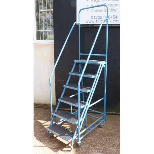 78 - A moveable step ladder with 6 steps to a height of 152cm. Safety rails to sides.