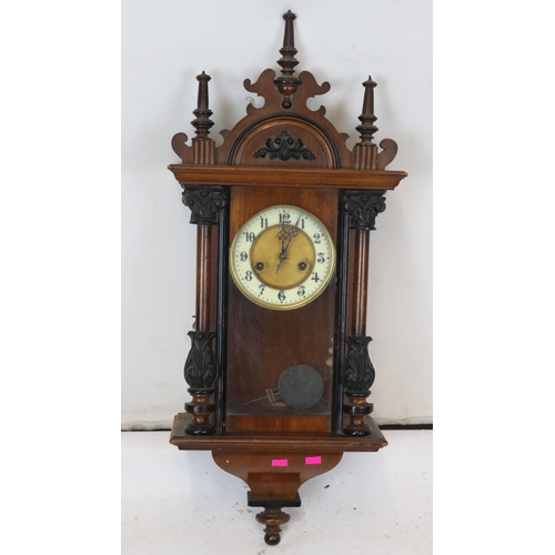 82 - Antique wall clock with key and pendulum