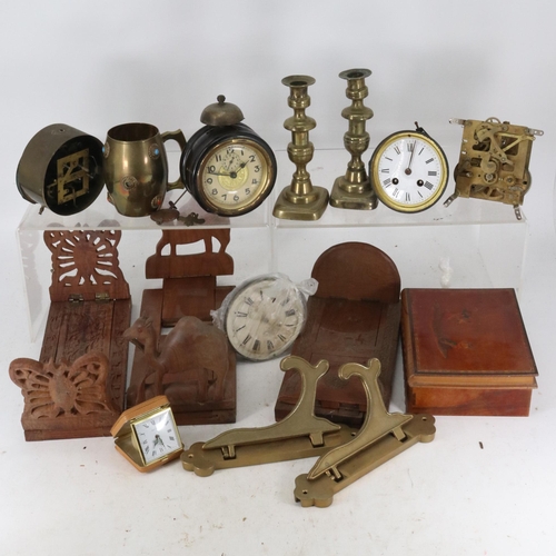 92 - Pair of brass wall fitting plate stands, brass candlesticks, bookslides, clock parts etc