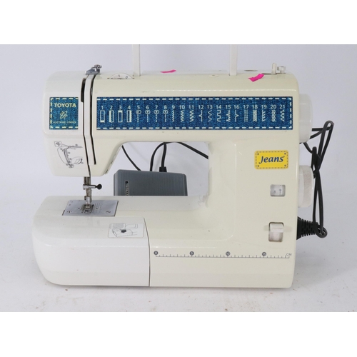 96 - A Toyota sewing machine, model JS021. Trade - spares or repairs.