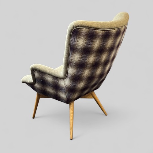 99 - Modern upholstered chair on beech legs, Checkered style pattern to back.