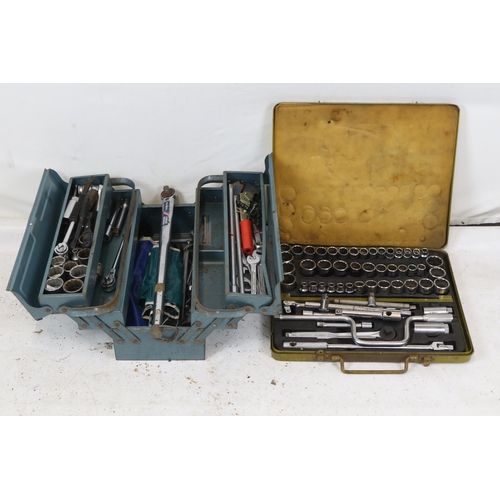 106 - A tool box with assorted spanners, sockets etc and a socket set.