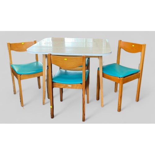 129 - A kitchen formica drop leaf table and four chairs (tag name Centa on chairs)