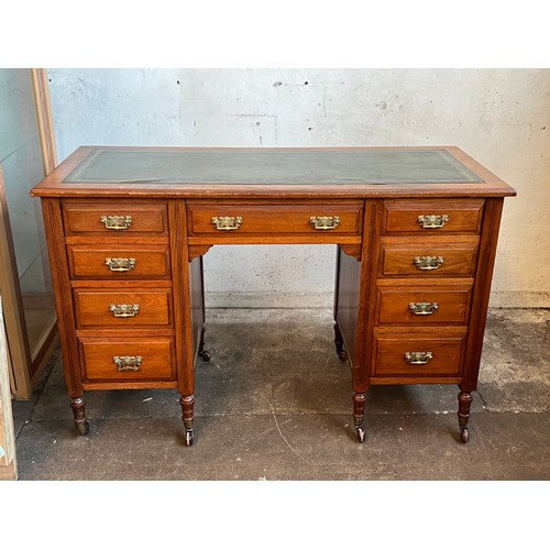 131 - Edwardian desk with green leather inset top approx. w 122cm x D 53cm x H 77cm