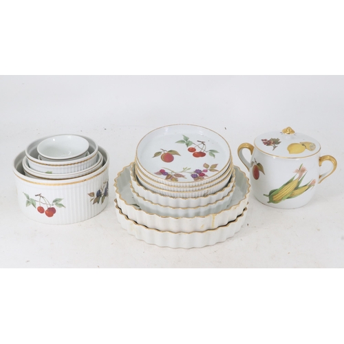 144 - A large quantity of Evesham dinnerware together with other ceramics.