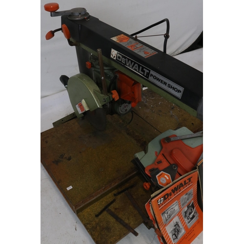 290 - A DeWalt DW125 Power Shop radial arm wood saw with instructions, manuals and accessories. Trade spar... 