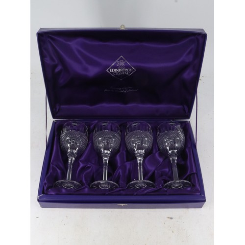 151A - A boxed set of four Edinburgh crystal wine goblets