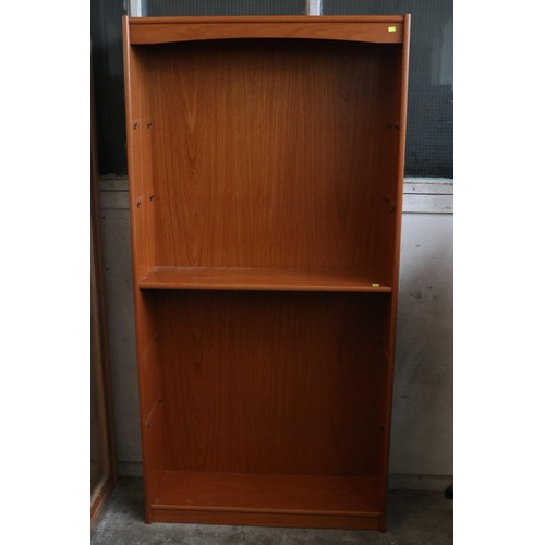 71 - A teak bookcase measuring approx. 90w x 28d x 181cmh.