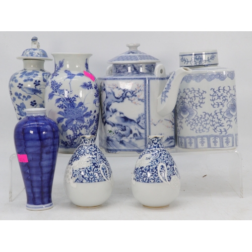 50 - A selection of oriental ceramics to include Pair of Japanese oil pourers, Japanese floral vase, mode... 