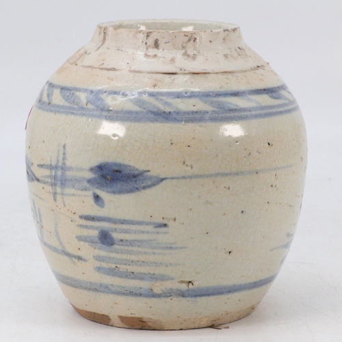 124 - A Chinese blue and white ginger jar of naive form and decoration (approx. height 14cm)