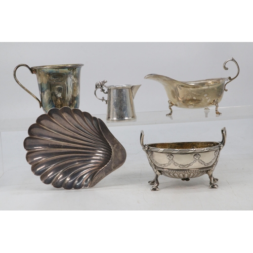 1 - Silver hallmarked clam shaped dish together with a silver hallmarked sauce boat, silver hallmarked t... 