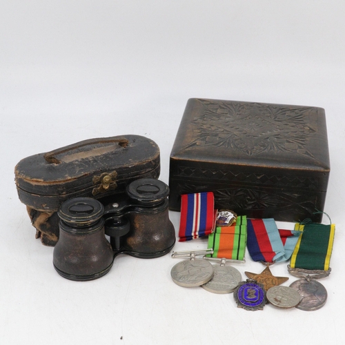 318 - WW2 Medals together with a Territorial efficiency medal, SIlver medallion, Binoculars inside a carve... 