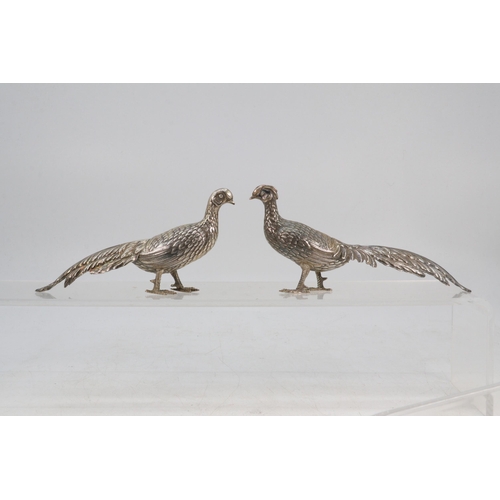 36 - Pair of white metal Pheasants