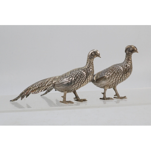 36 - Pair of white metal Pheasants