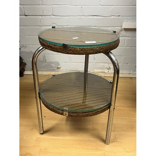 176 - A two tier Lloyd Loom? side table with chrome legs