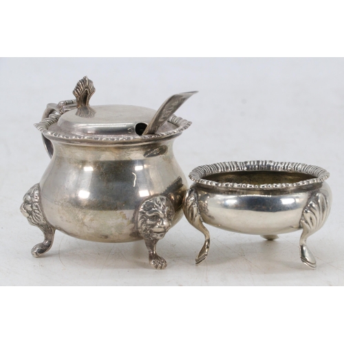 25 - Silver mustard pot with spoon, retailed by Harrods, together with a silver salt (189g)