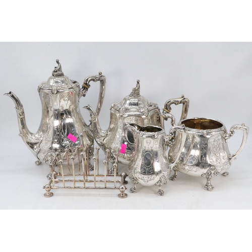 35 - Antique decorative silver plated tea set on ball and claw feet together with a toast rack