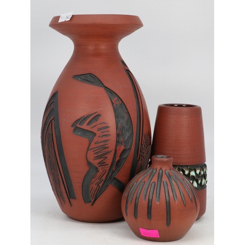 47 - Tall Poole pottery Atlantis vase together with two similar all by Catherine Connett