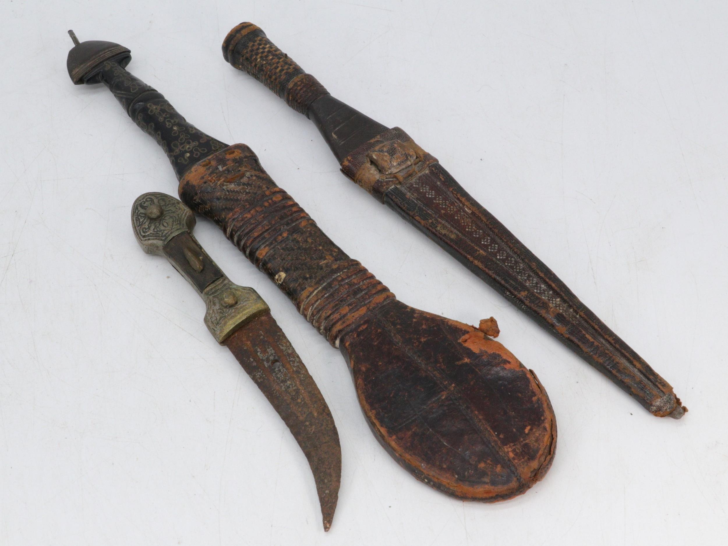 Three antique tribal daggers