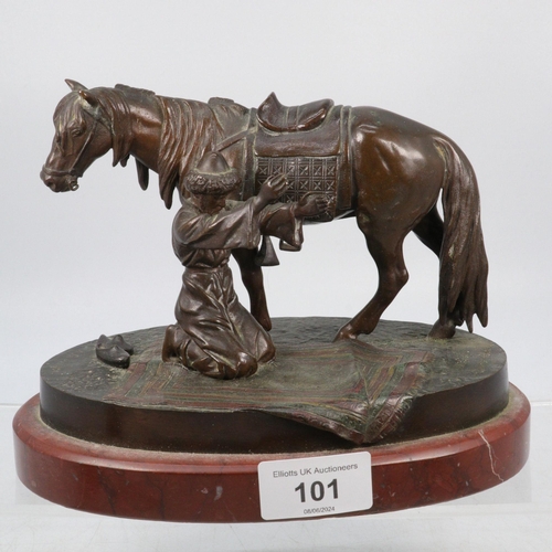 101 - Bronze study of horse and Arab prayer, measures approx. 14cm high, x 19cm wide