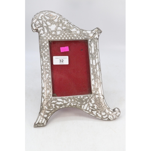 32 - Decorative silver overlaid oriental frame