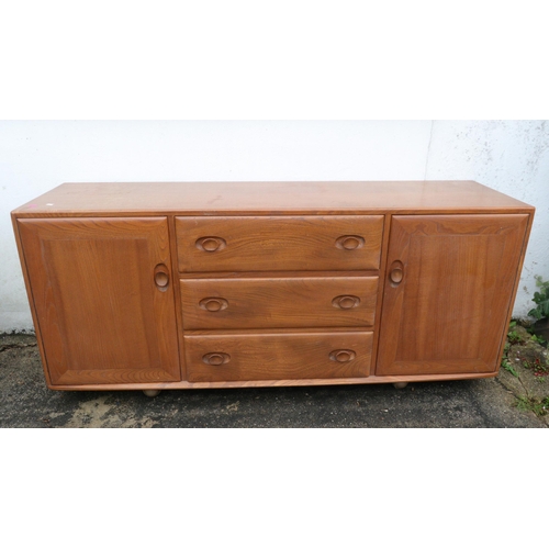 595 - Ercol sideboard showing light wear to top