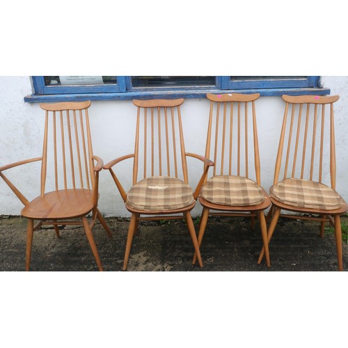 609 - Set of six Ercol stick back dining chairs including two carvers