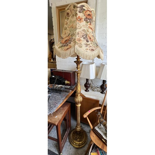 601 - A gilt standard lamp