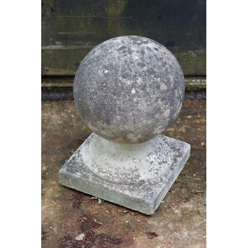 21 - Composite sphere on plinth measures approx. 35cmH