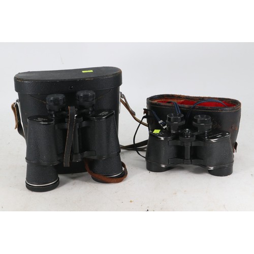 29 - A cased set of Pentax binoculars together with another 7x35 field binoculars