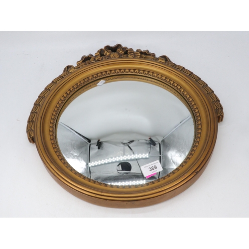 39 - An E-Gomme gilt framed convex mirror (mirror approx. 30cm diameter)