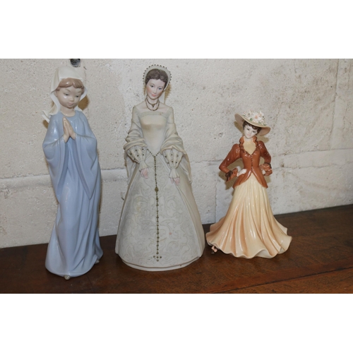 46 - Nao figurine together with a Coalport lady of fashion 'Joan' and one other