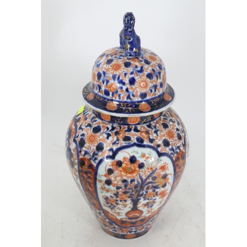 54 - Imari lidded jar with dog of Fo to top of the lid,  measures approx. 37cm tall