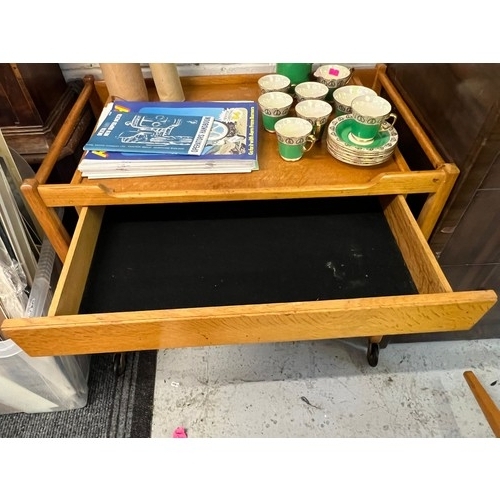 65 - An oak midcentury coffee table (A/F)with similar trolley