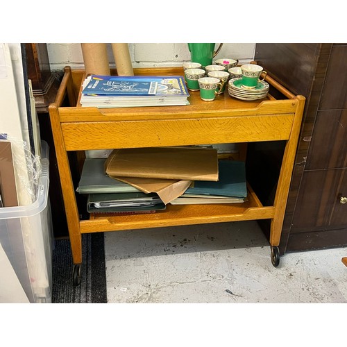 65 - An oak midcentury coffee table (A/F)with similar trolley