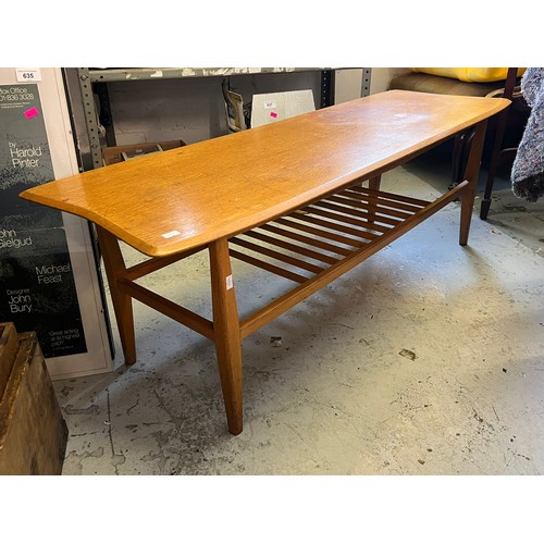 65 - An oak midcentury coffee table (A/F)with similar trolley