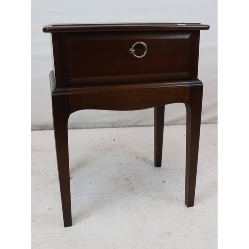 83 - A Stag Minstrel bedside table, model S191, measuring approx. W44.5cm x D32cm x H58cm.