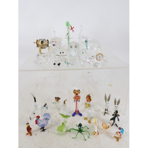 91 - Quantity of Murano style miniature figurines and animals together with a quantity of Swarovski simil... 